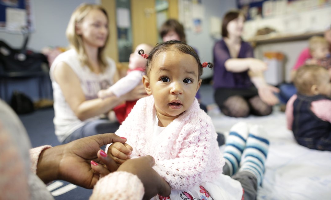 Parents and babies singing in a Baby Peep group