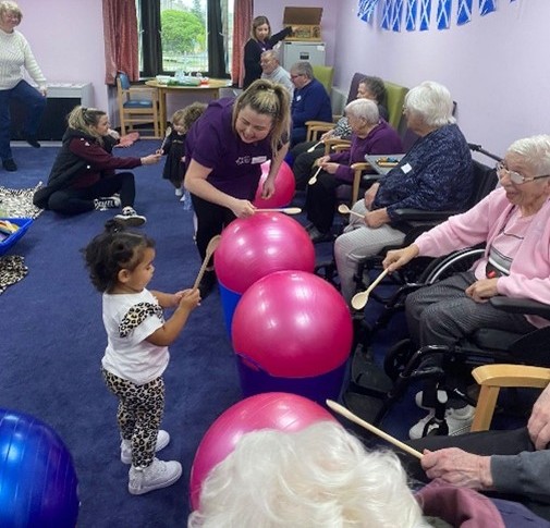 Intergenerational Peep - playing drums